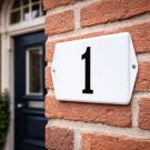 Basisk husnummer modell öra