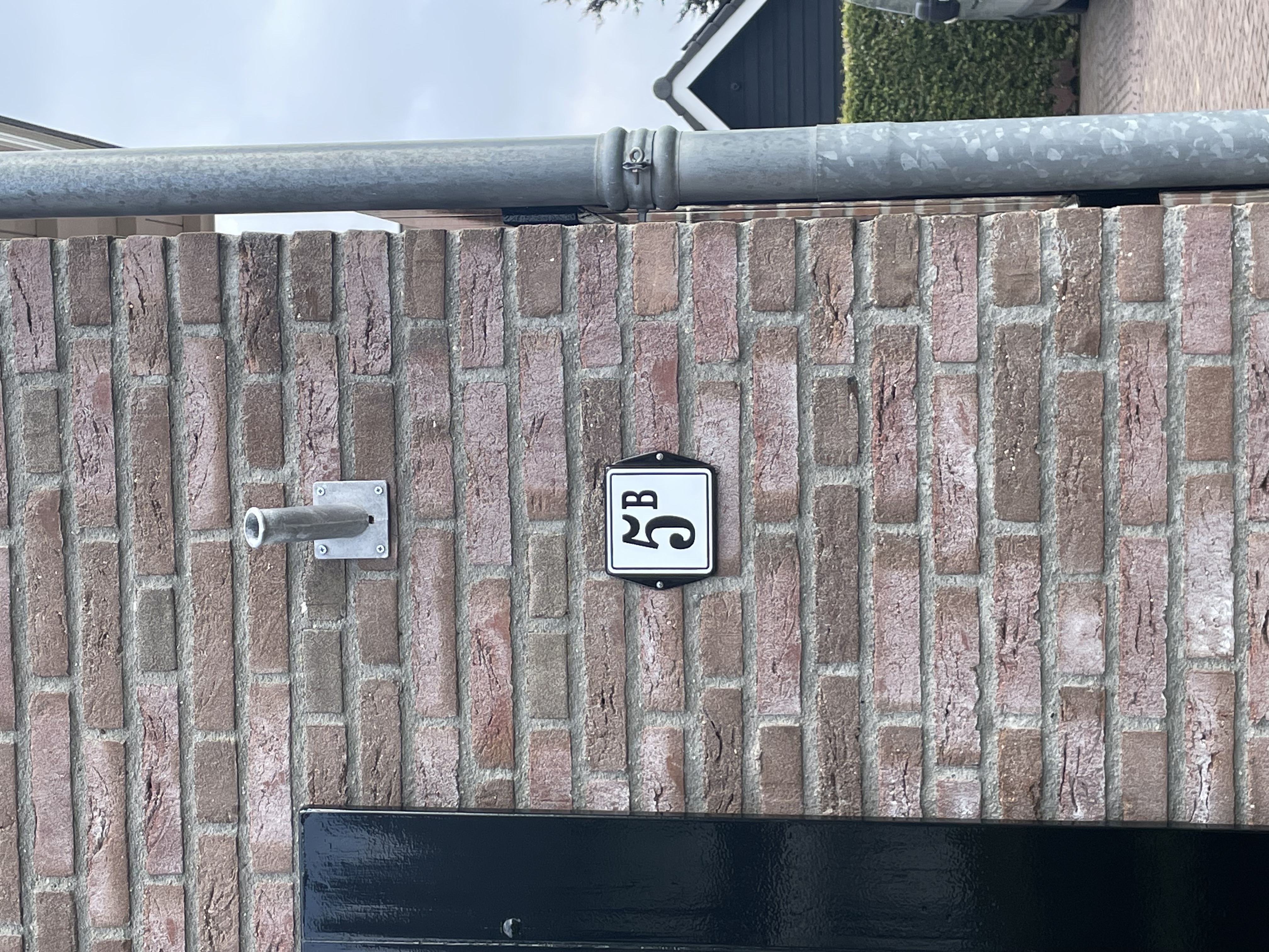 Husnummer modell öra färgade öron med ram