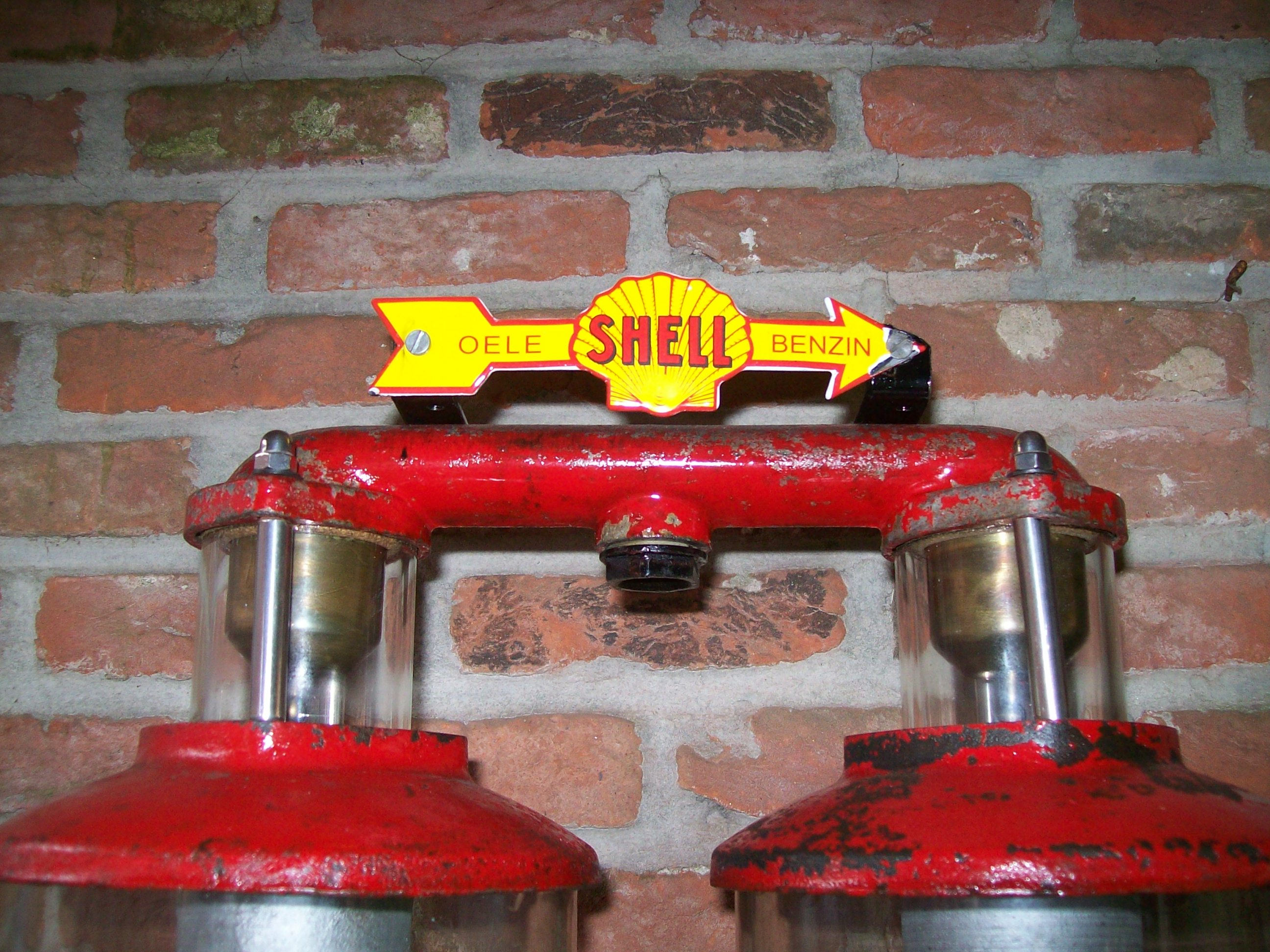 Shell pil formade reklam tecken